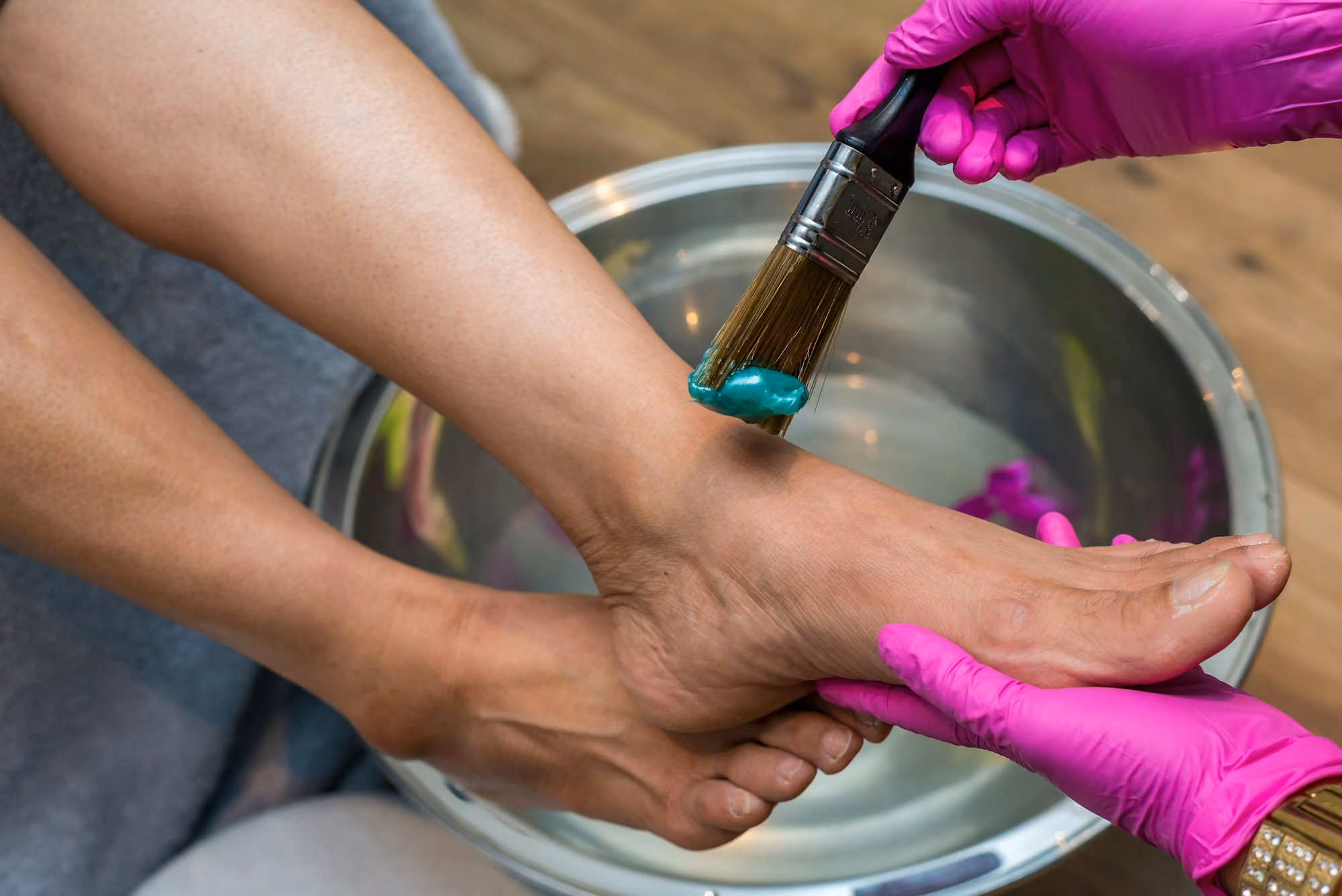Pedicure treatment in a copper basin at the salon