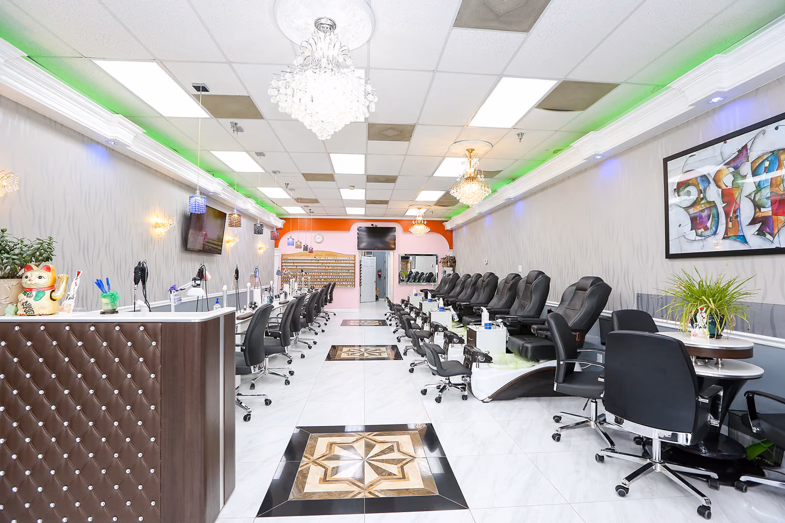 The entrance of Crystal Nails Norfolk with chandelier and front desk